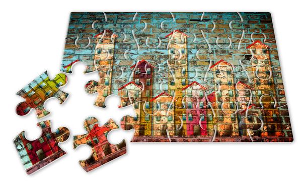 Public housing concept image painted on a brick wall in puzzle shape - Photo, Image