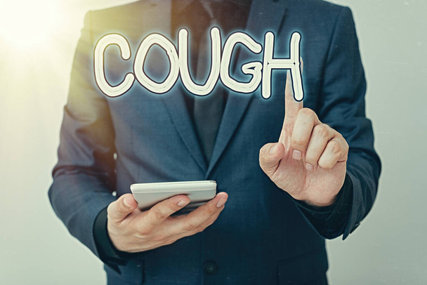 Writing note showing Cough. Business photo showcasing sudden expulsion of air throughout the passages to clear airways Model with pointing hand finger symbolizing navigation progress growth. - Photo, Image