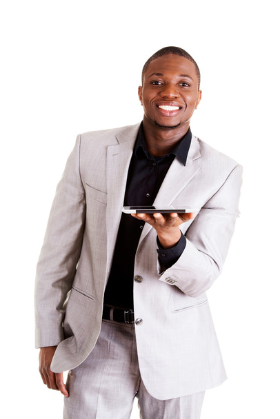 Handsome businessman working on tablet computer. - Foto, afbeelding