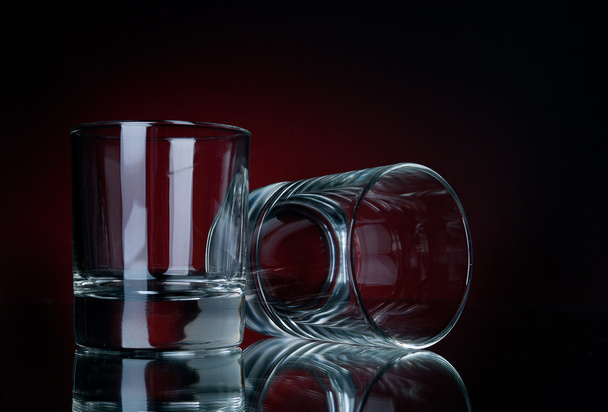 Glasses on a red background - Фото, зображення
