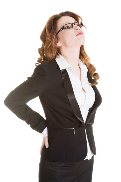 Businesswoman with back pain. - Photo, Image