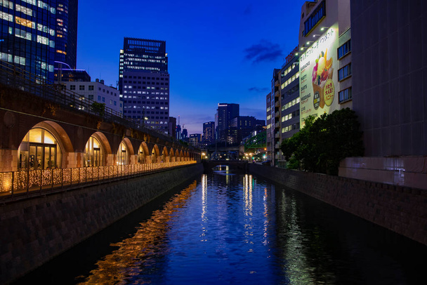 A dusk of the river at Mansei bridge in Tokyo - Фото, изображение