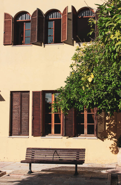 Yellow house with wooden windows in Israel - Photo, Image