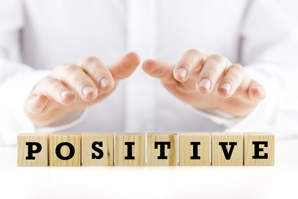 Man holding his hands over the word Positive - Photo, Image
