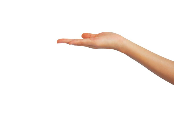 main de femme asiatique est tendre la main pour obtenir quelque chose isolé sur fond blanc - Photo, image