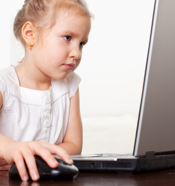 Child with laptop - Фото, изображение