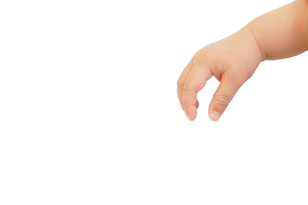 dłoń grubego azjatyckiego chłopca jest w Sięgając do gestu chwycić coś na białym tle - Zdjęcie, obraz