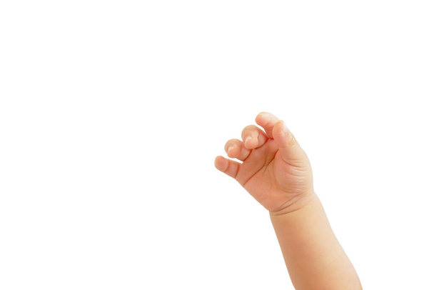 рука жирного азиатского мальчика в протягивая жест, чтобы захватить что-то на белом фоне
 - Фото, изображение