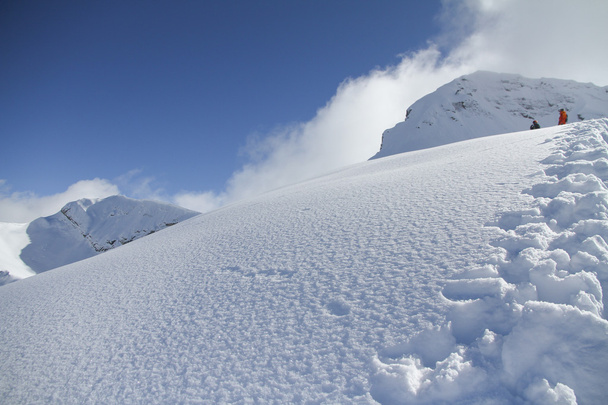 Ski slope in powder snow, mountain landscape - Фото, зображення
