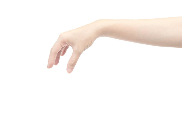 hand van de vrouw is uit te reiken in pick gebaar geïsoleerd op witte achtergrond - Foto, afbeelding