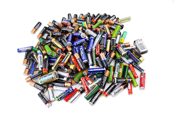 Different types of used batteries ready for recycling - Фото, изображение