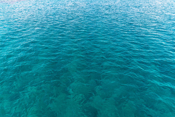 Beautiful background with sea water. Surface of mediterranean sea - Foto, Imagen