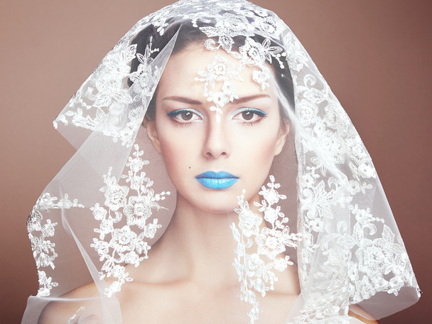 Fashion photo of beautiful women under white veil - Foto, Imagen
