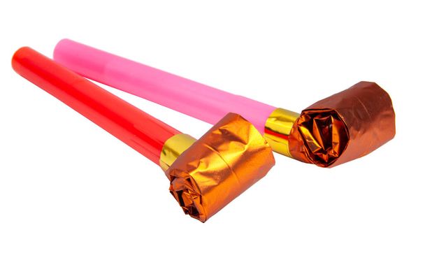 Party colorful foil noisemaker rolled or whistle isolated on the white - Photo, Image