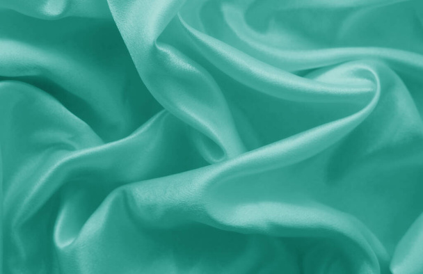 Smooth elegant blue silk or satin texture can use as background - Photo, Image