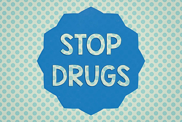 Writing note showing Stop Drugs. Business photo showcasing put an end on the dependence on substances such as heroin or cocaine Twelve 12 Pointed Star Dodecagon in Zigzag effect Polygon. - Photo, Image