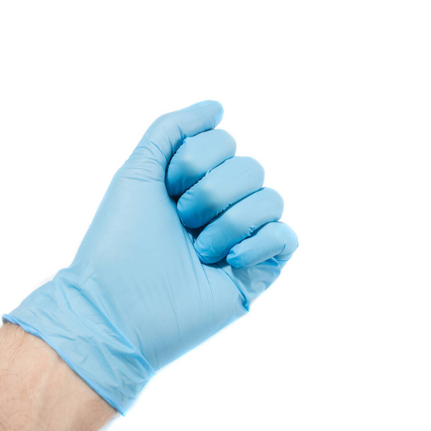 main en gants médicaux bleus - Photo, image