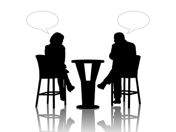 man en vrouw spreken aan de tafel in een café - Foto, afbeelding