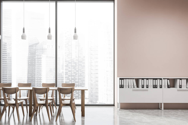 Interior of modern office cafe with pink walls, cocnrete floor, dining table with wooden chairs and shelves with folders. Blurry cityscape. 3d rendering - Fotoğraf, Görsel