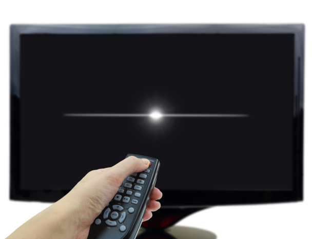 Pantalla de televisión en negro 3D con control remoto y mano
 - Foto, Imagen