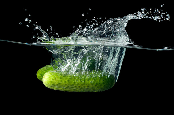 Cucumber splashing in water - Foto, Imagem