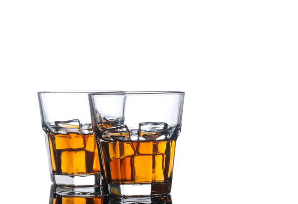 Whiskey glasses on white background - Фото, изображение