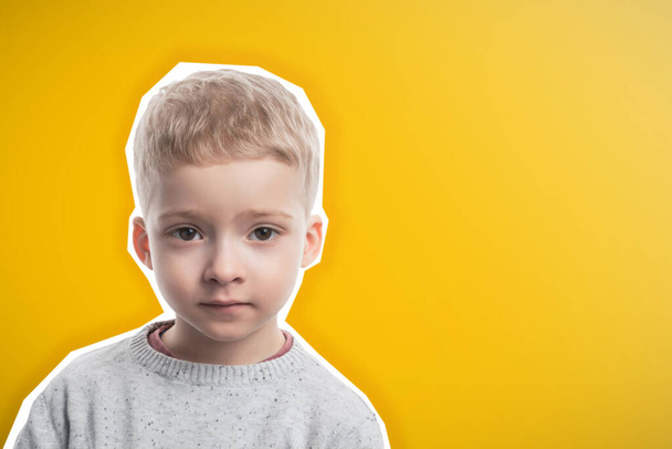 cute preschool boy on yellow background - Фото, изображение