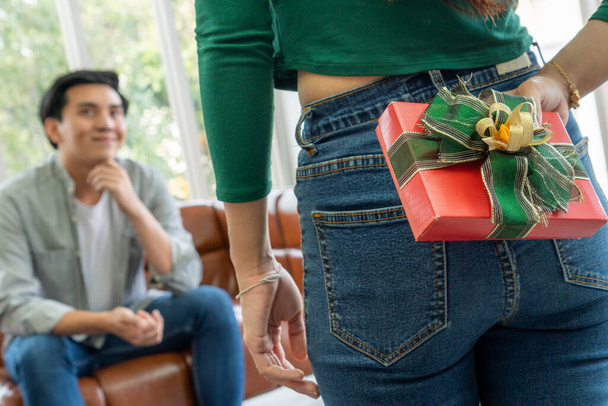 Happy couple giving gift present to celebrate anniversary. Marriage lifestyle, love and relationship concept. - Photo, Image