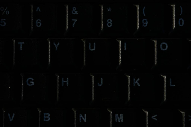A shallow focus closeup shot of a black computer keyboard - Foto, Bild