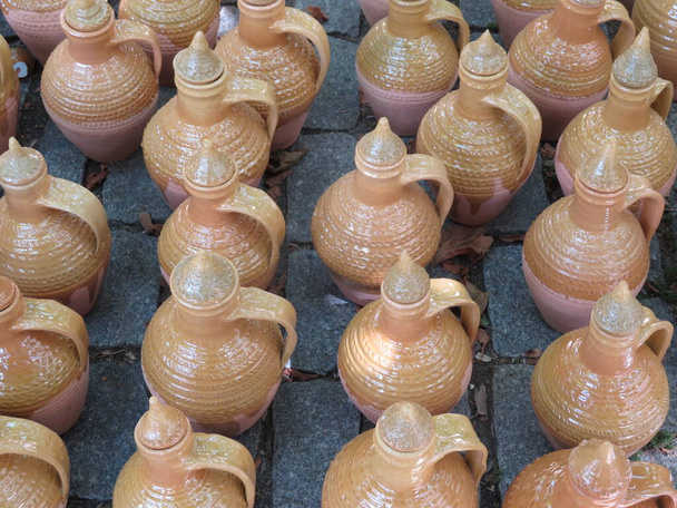 Beautiful kitchen utensils made of clay by hand by expert hands - Photo, Image