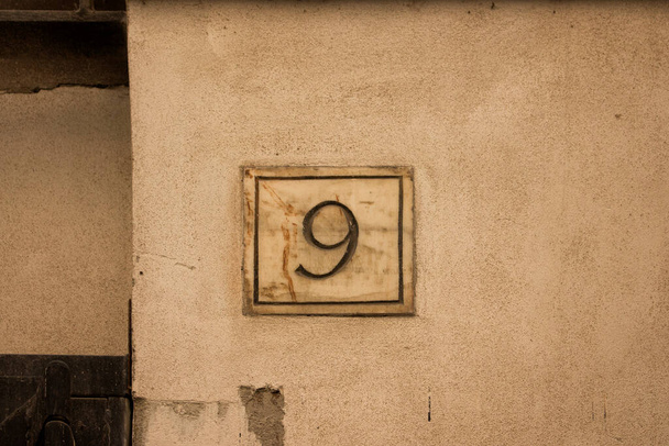 Engraved old building number 9 in Rome - Zdjęcie, obraz