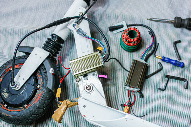 Closeup of scooter at electric motor repair service - Foto, Imagem