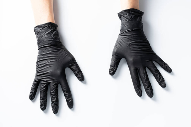 top view of hands in protective gloves on white background  - Fotografie, Obrázek