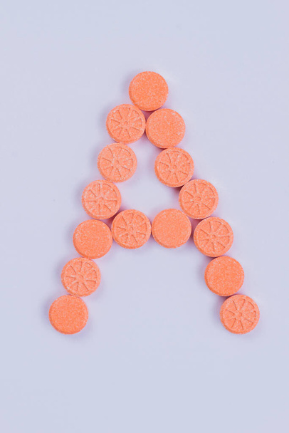 The letter A made fo round pills. - Valokuva, kuva