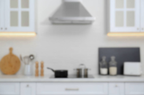 Blurred view of modern kitchen with stove - Fotografie, Obrázek