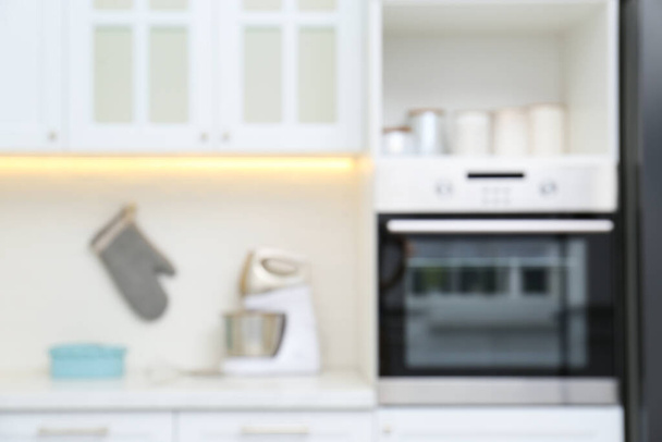 Blurred view of modern kitchen with appliances - Photo, Image