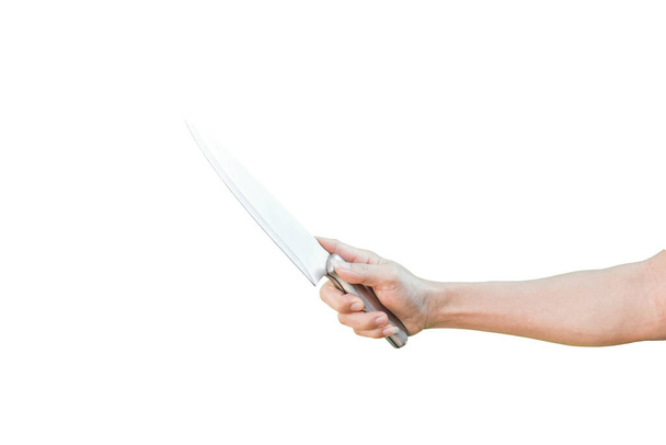 mano que sostiene el cuchillo inoxidable aislado en el fondo blanco con la trayectoria del recorte
. - Foto, Imagen