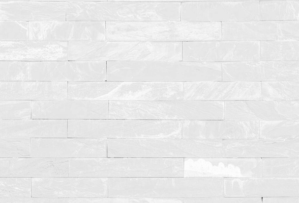 Primer plano de ladrillos de piedra blanca fondo de la pared
 - Foto, imagen