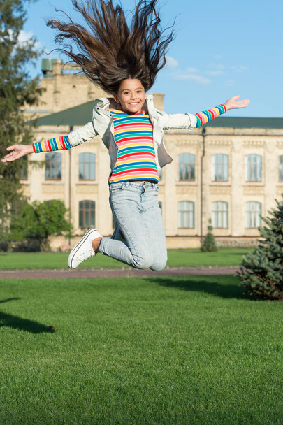 Happiness and joy. Childhood happiness. Smart small happy girl ready to study. fashion and beauty. Carefree and cheerful. Feeling free. Extreme energy. Freedom concept. Schoolgirl back to school - Fotografie, Obrázek