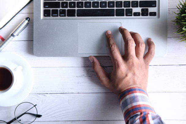 Close up of man hand typing on laptop. - Fotoğraf, Görsel
