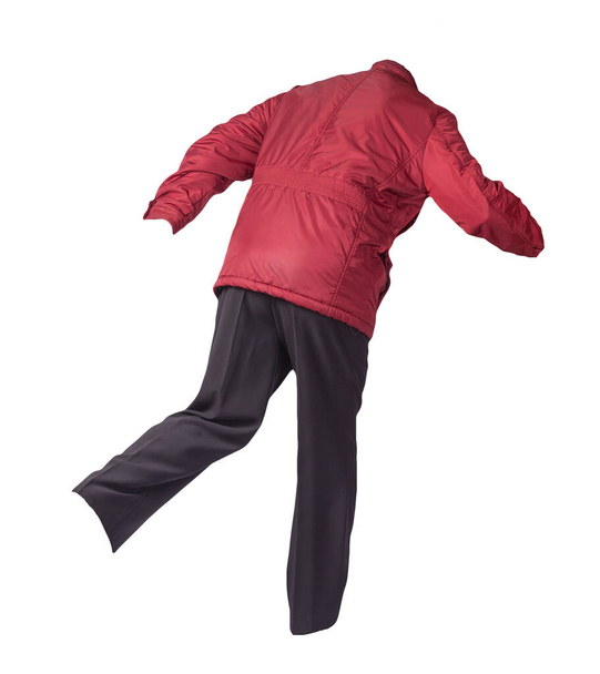 men's red jacket and black pants isolated on white background. men's autumn clothes - Photo, image