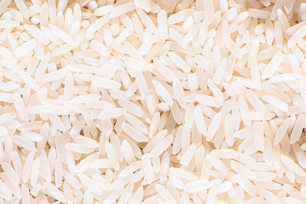 Granos de arroz vistos desde arriba.Fondo de arroz basmati (Vista superior
) - Foto, Imagen