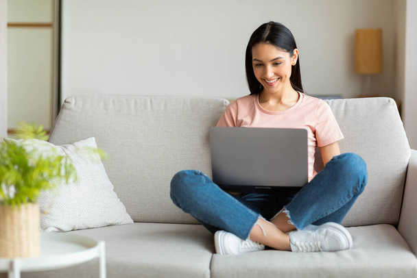 Lady Working On Laptop Computer Sitting On Couch At Home - Photo, Image