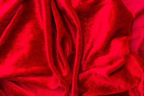 Creative art photography velvet fabric textile similar in shape to a female vagina, female energy and health concept - Foto, afbeelding