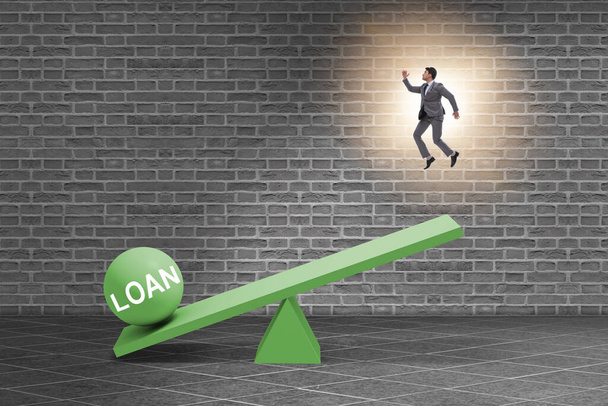 Debt and loan concept with businessman and seesaw - Photo, Image