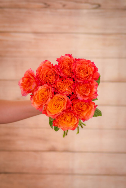 Close up of a bouquet of Free Spirit roses variety, studio shot, orange flowers - Foto, imagen