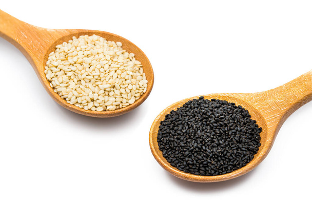 white and black sesame seeds with spoon isolated on white background - Photo, Image