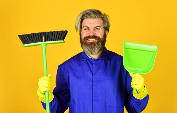 clean up. bearded man cleaning with mop. Janitor in gloves. husband cleaning house. Housework and domestic duty. Male janitor with cleaning supply. sweeping the floor. man cleaner - Фото, изображение