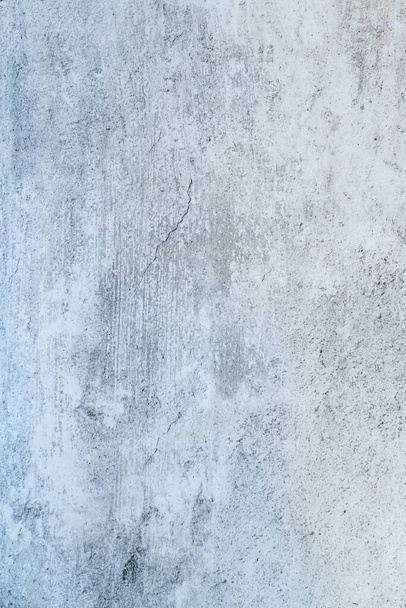 Un colpo verticale di una superficie di cemento bianco con grunge e spazio copia - Foto, immagini