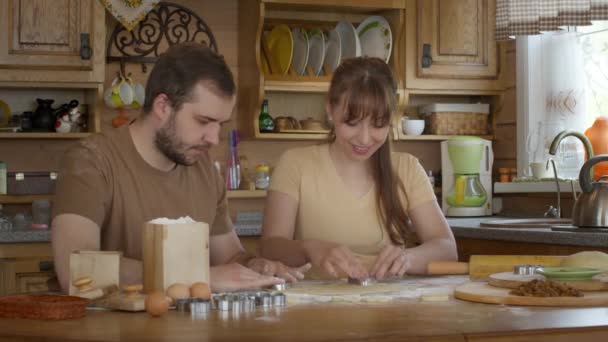 Husband and wife make dough for baking together on a day off. - Footage, Video